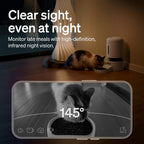 Automatic pet feeder with night‑vision camera showing a cat eating in low light and a smartphone view with 145‑degree infrared monitoring.