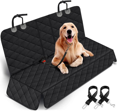 dog sitting on black waterproof non slip car seat cover with armrest access and adjustable straps installed on back seat